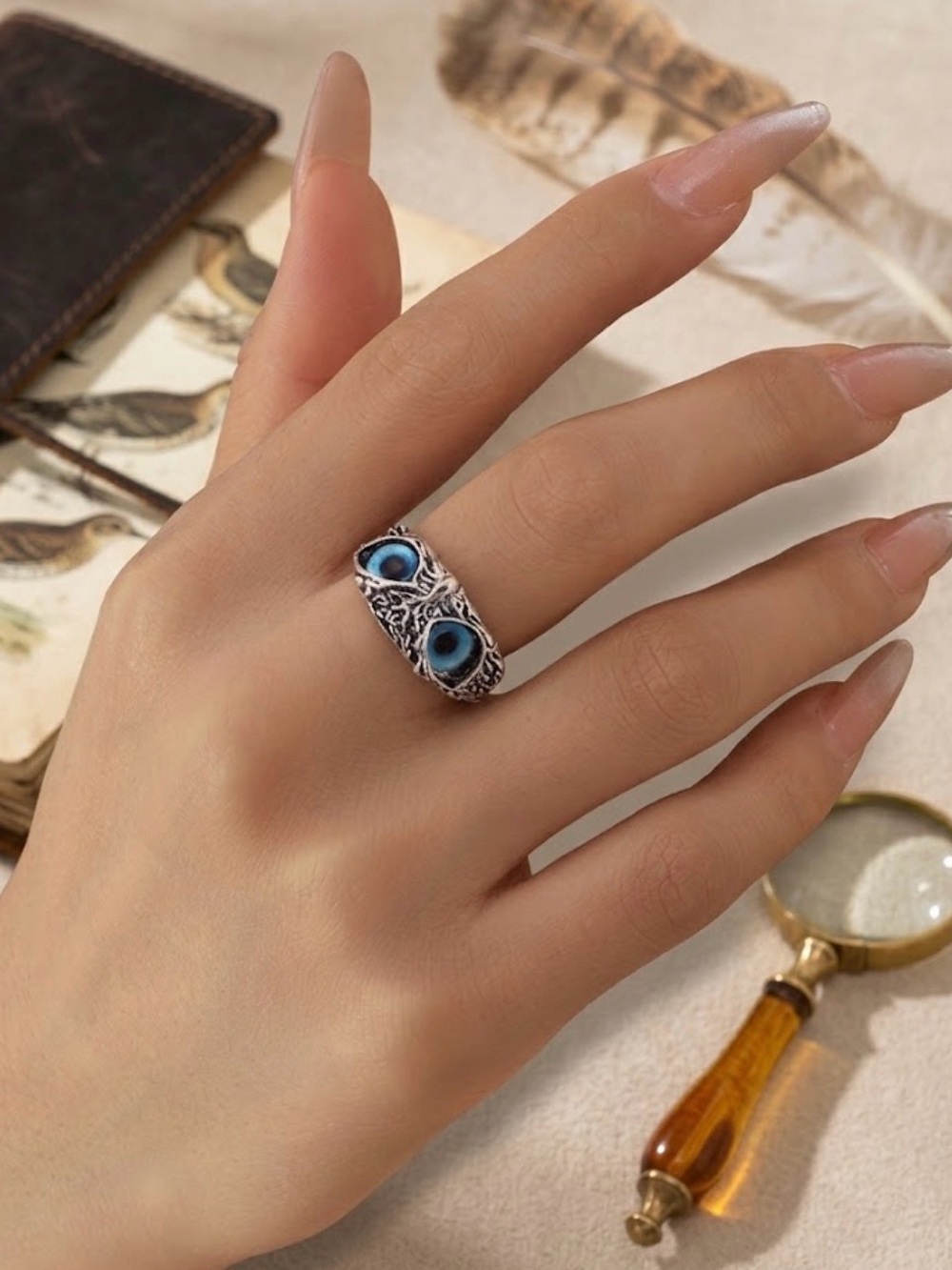 Intricate Silver Owl Head Statement Ring with Vibrant Blue Glass Eyes - Vintage